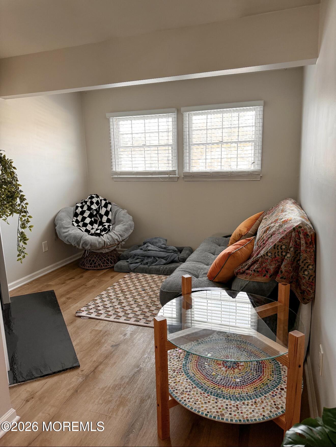 22 Alexandria Way Basking Ridge, NJ 07920 - Photo 21 of 31 a living room with a couch and a table