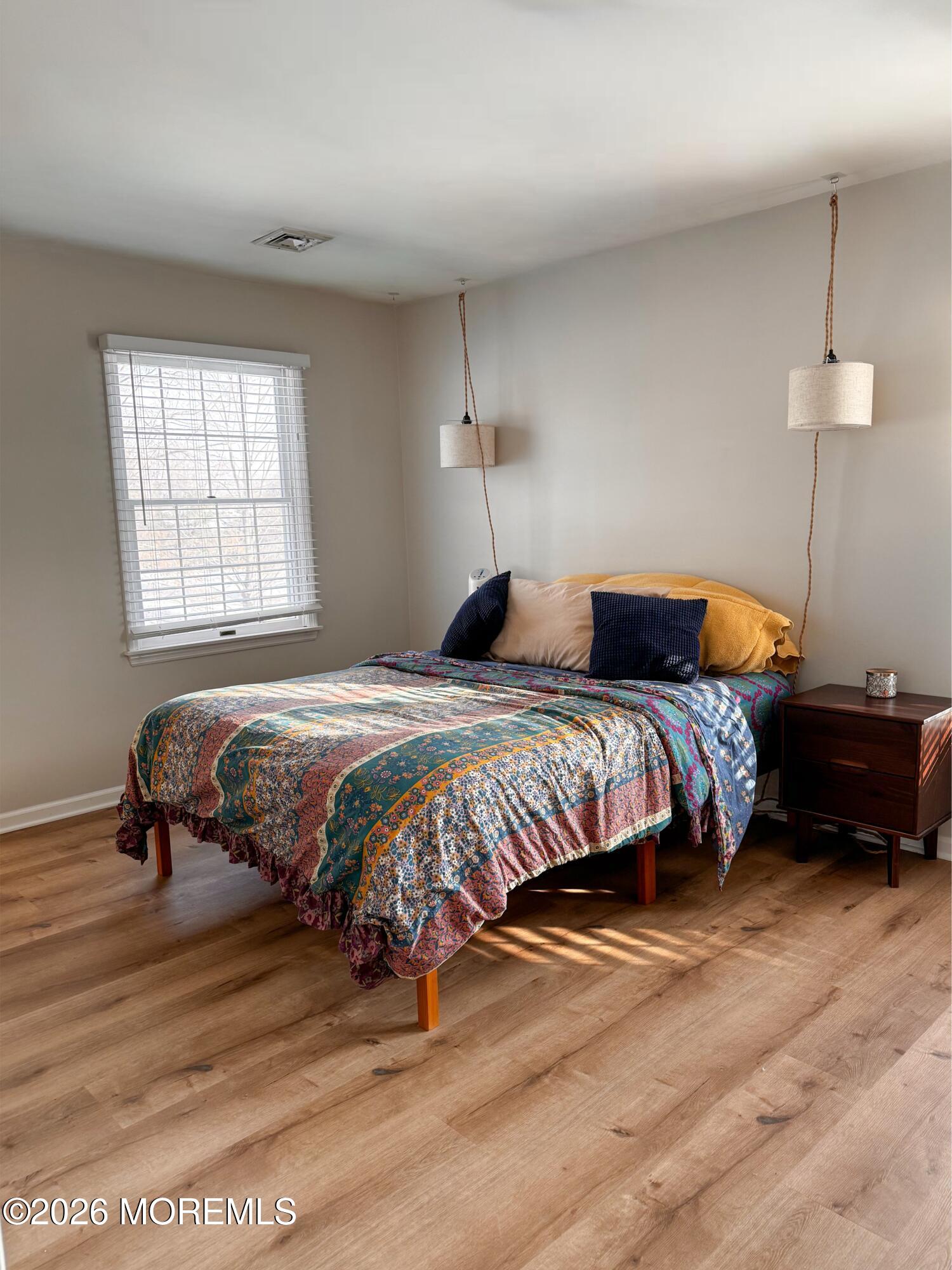 22 Alexandria Way Basking Ridge, NJ 07920 - Photo 22 of 31 a bedroom with a bed and a dressers
