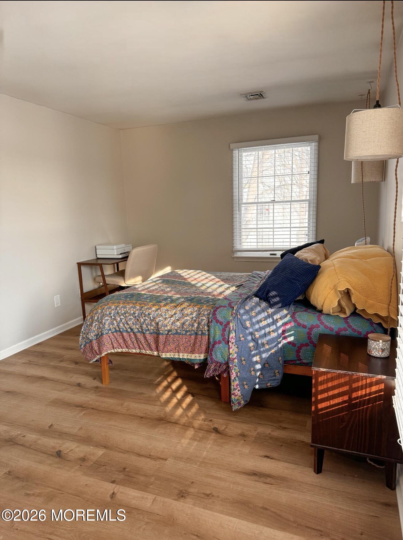 22 Alexandria Way Basking Ridge, NJ 07920 - Photo 25 of 31 a bedroom with a bed chair and a window