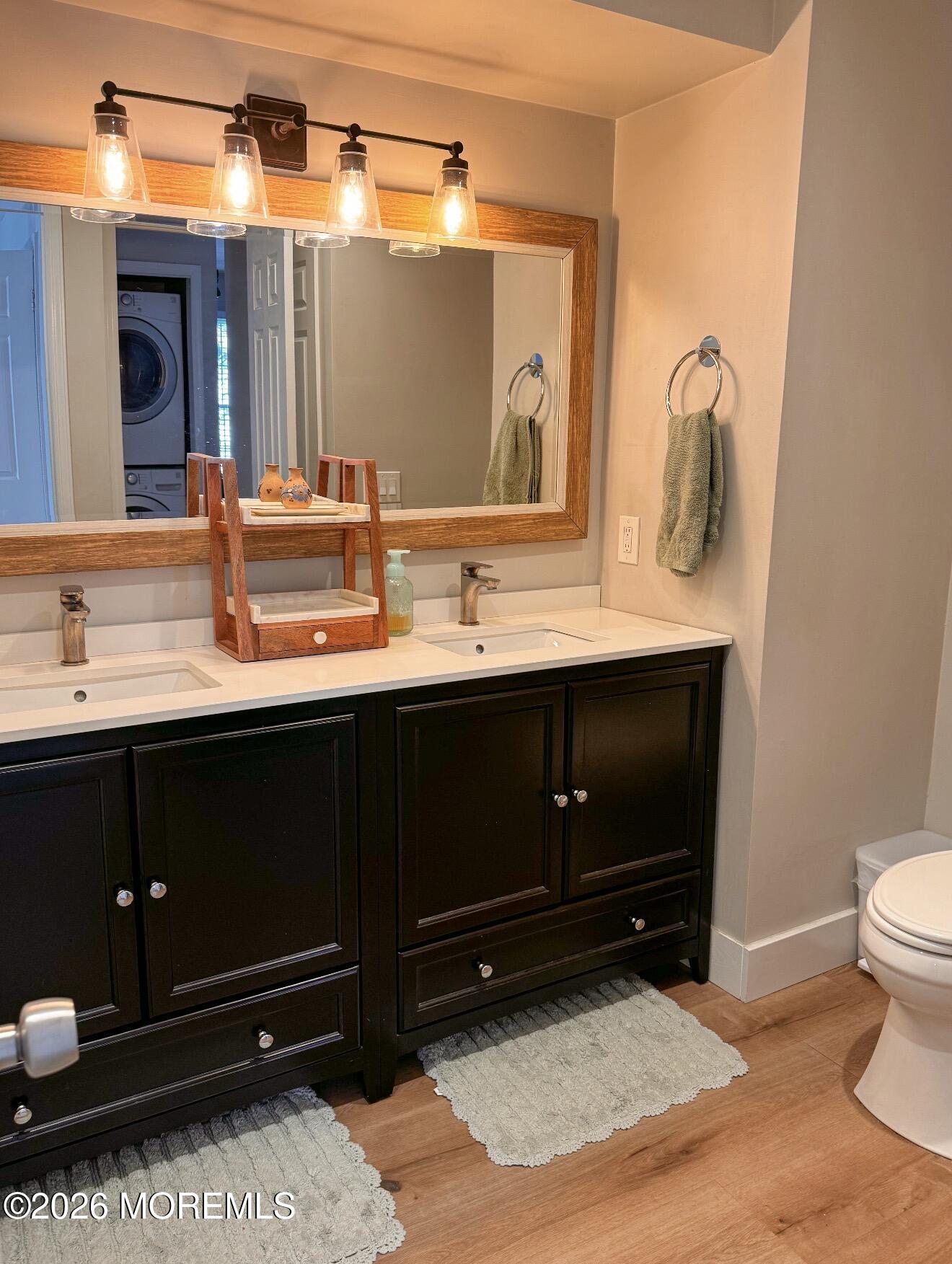 22 Alexandria Way Basking Ridge, NJ 07920 - Photo 27 of 31 a bathroom with a sink and a mirror