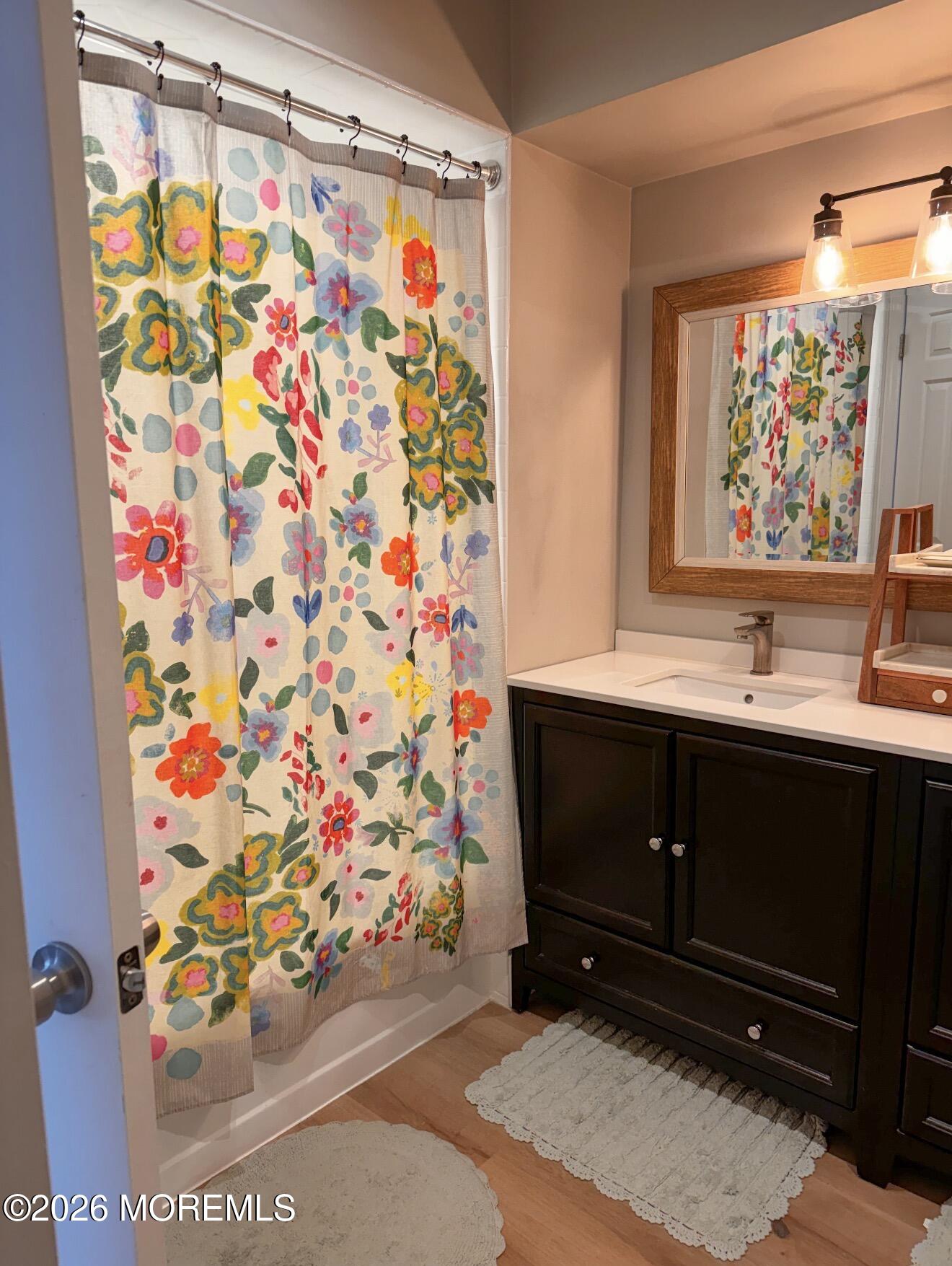 22 Alexandria Way Basking Ridge, NJ 07920 - Photo 28 of 31 a bathroom with a sink and a mirror
