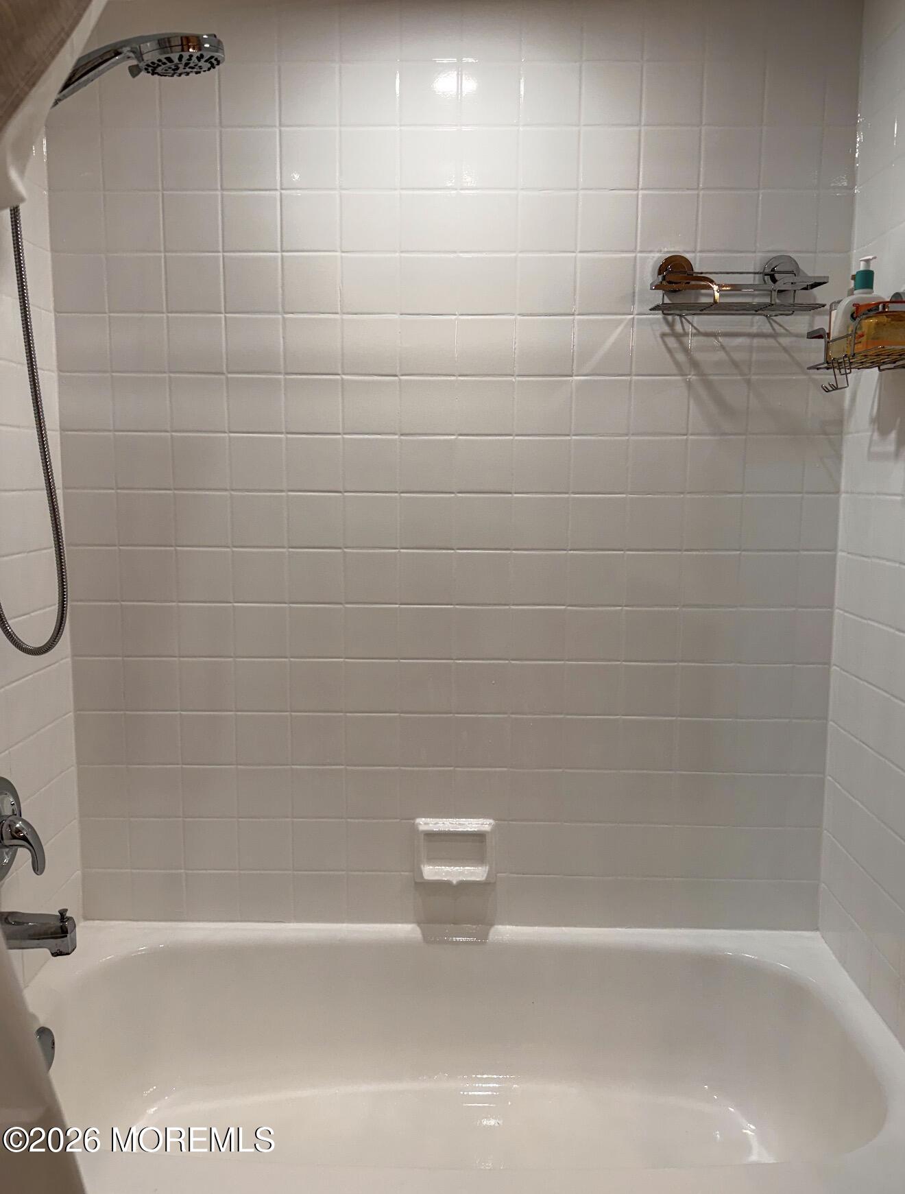 22 Alexandria Way Basking Ridge, NJ 07920 - Photo 29 of 31 a bathroom with a shower and a bathtub