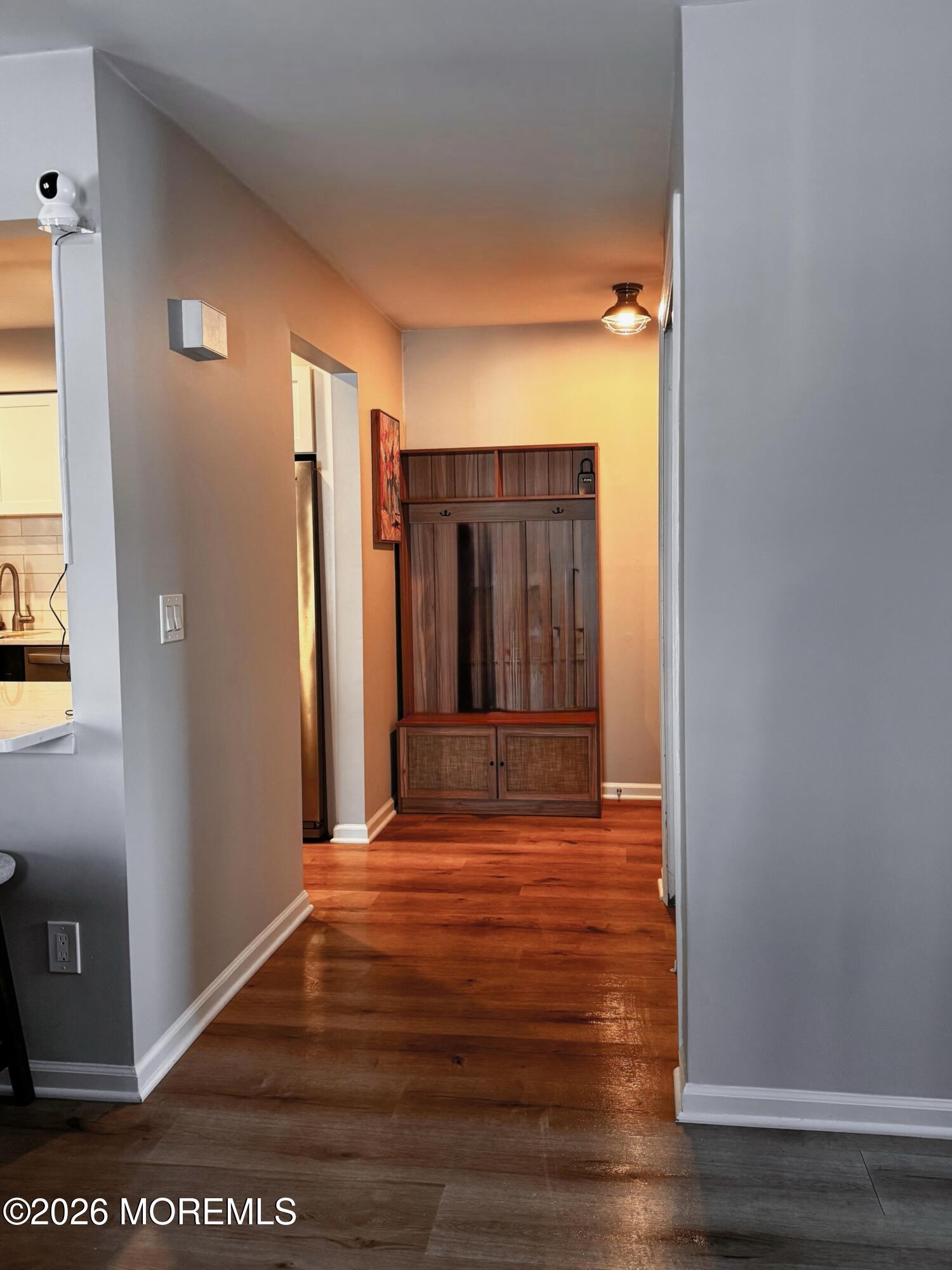 22 Alexandria Way Basking Ridge, NJ 07920 - Photo 6 of 31 a view of a room with wooden floor and windows