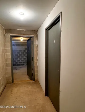 a kitchen with stainless steel appliances granite countertop a stove a microwave and a refrigerator