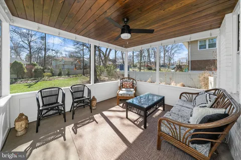 a outdoor living space with furniture and garden view