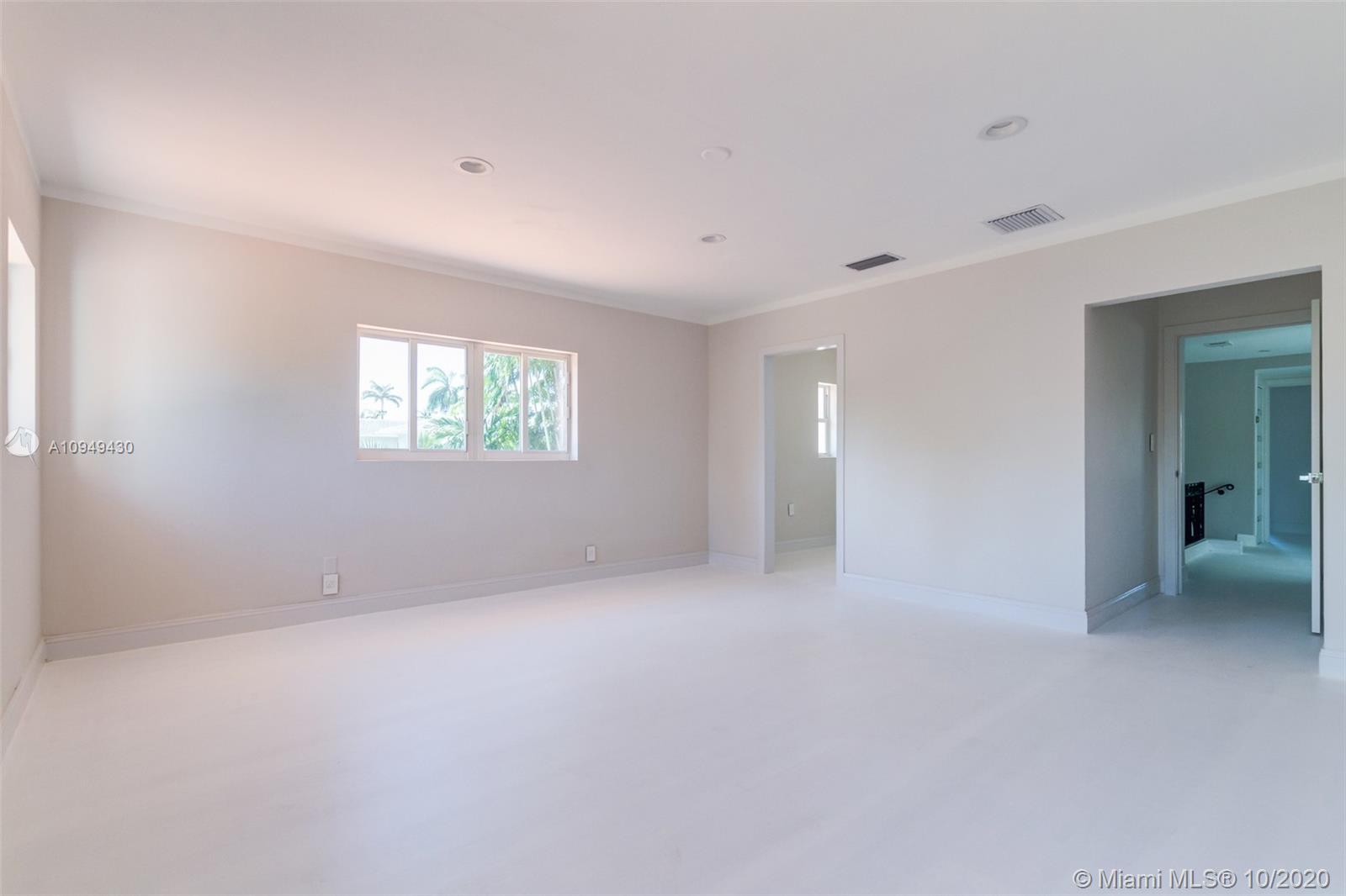 6030 Alton Road Miami Beach, FL 33140 - Photo 31 of 51 a view of an empty room with a window
