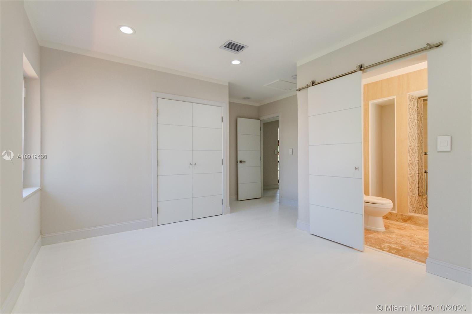 6030 Alton Road Miami Beach, FL 33140 - Photo 35 of 51 an empty room with closet