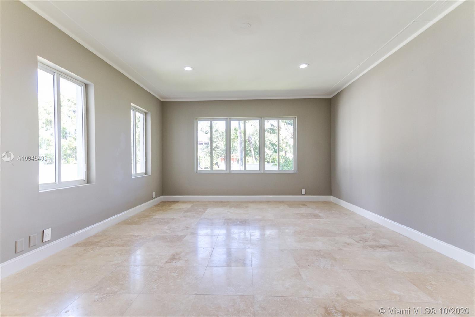 6030 Alton Road Miami Beach, FL 33140 - Photo 46 of 51 a view of an empty room with a window