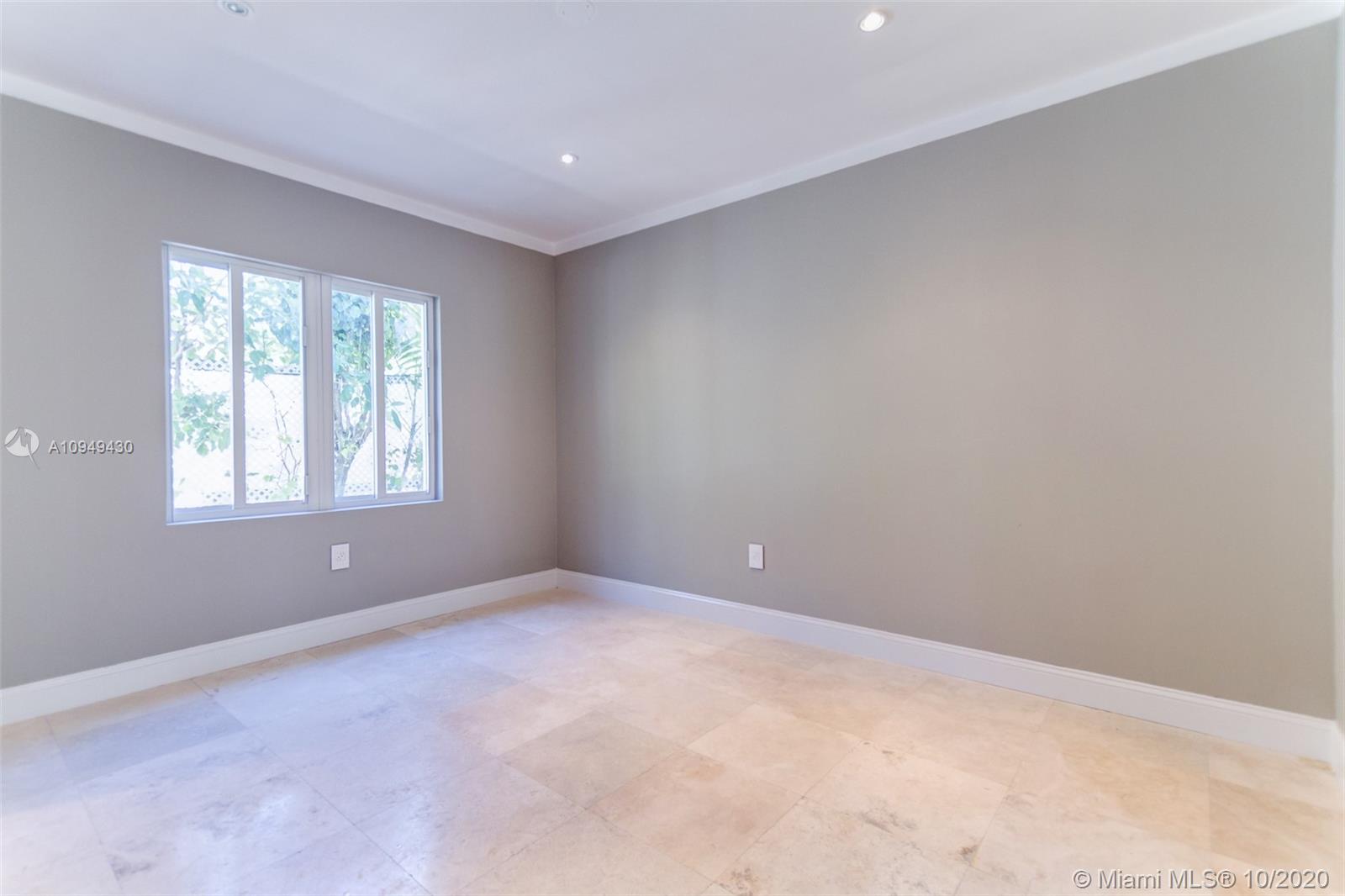 6030 Alton Road Miami Beach, FL 33140 - Photo 49 of 51 a view of an empty room with a window