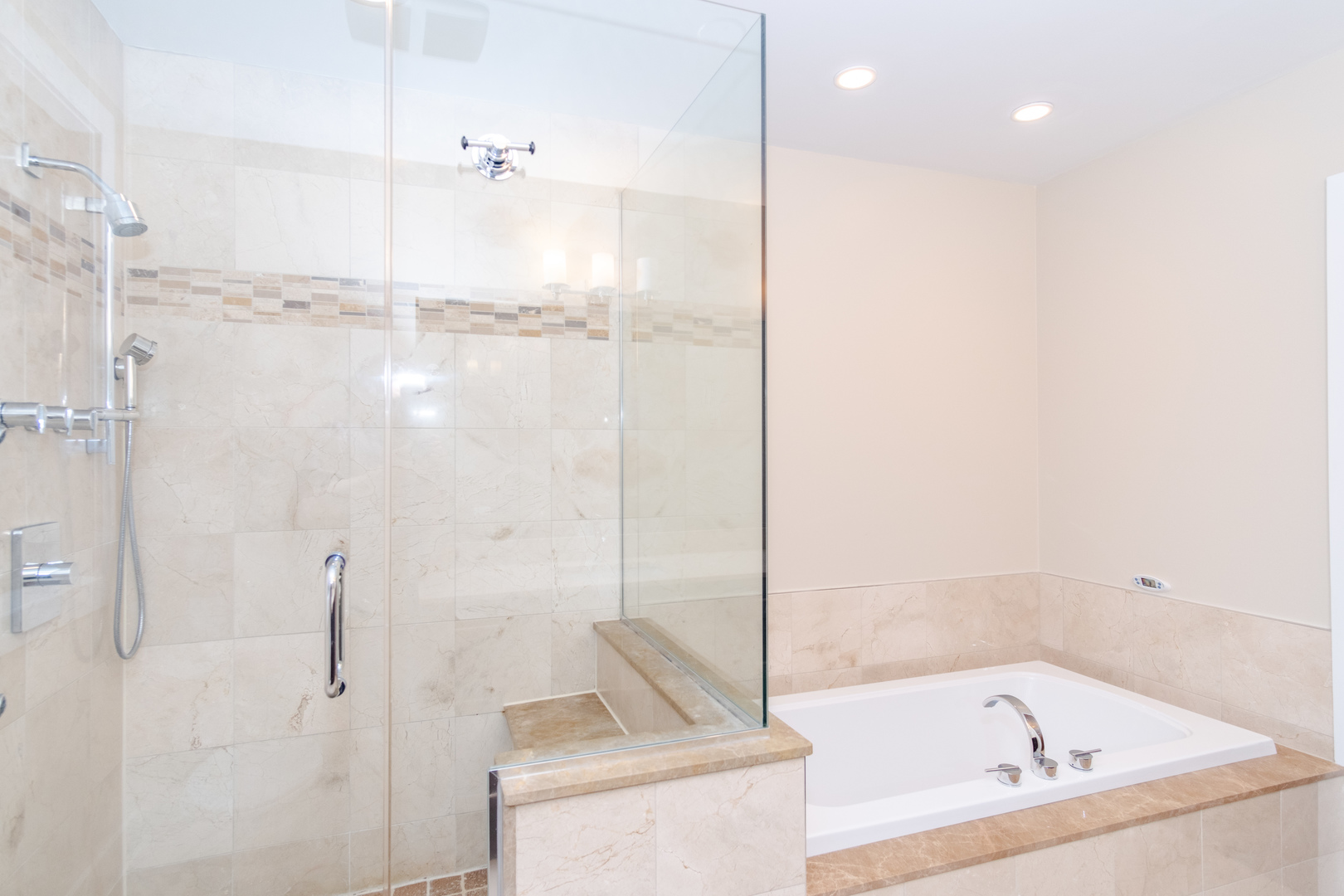 1242 West Jackson Boulevard, Unit 1W Chicago, IL 60607 - Photo 16 of 24 a bathroom with a bathtub and a shower