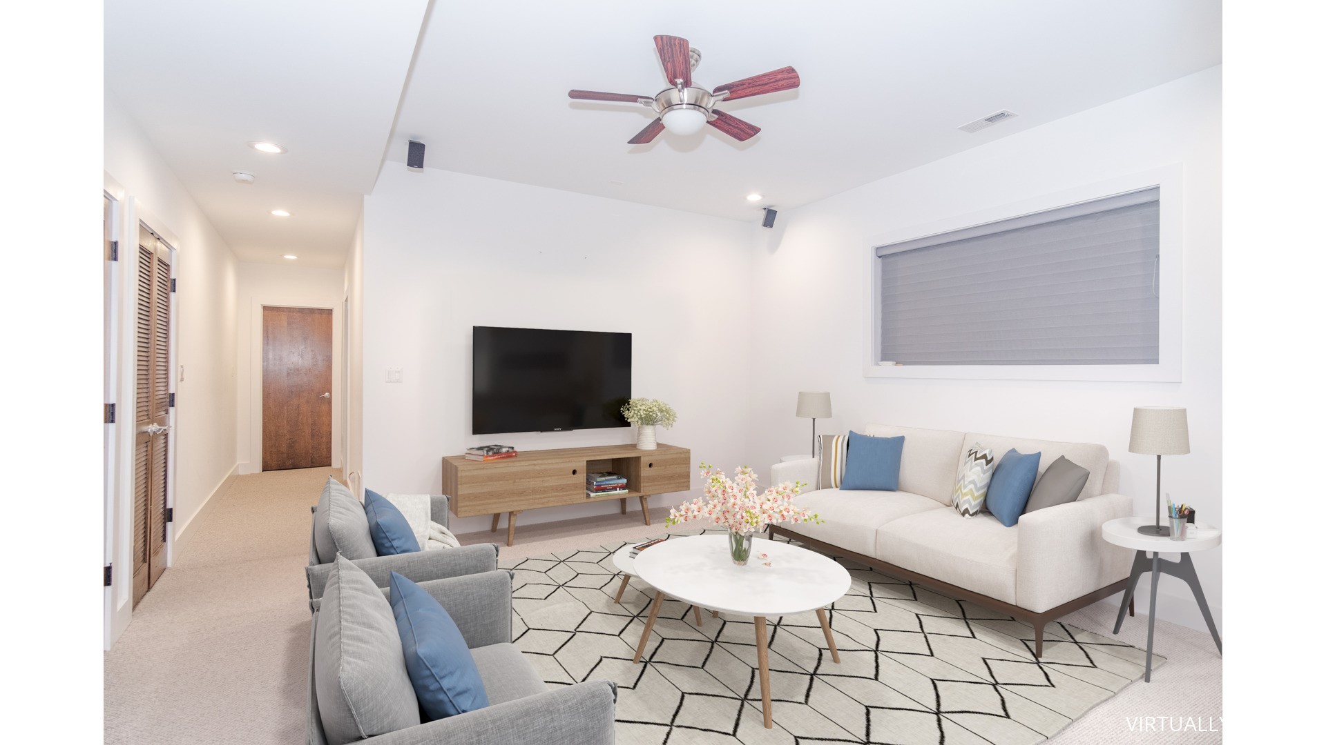 1242 West Jackson Boulevard, Unit 1W Chicago, IL 60607 - Photo 18 of 24 a living room with furniture and a flat screen tv