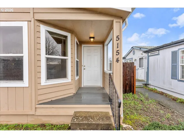 a view of a house with a porch