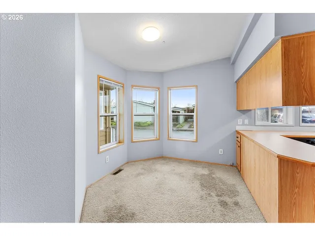 a view of a kitchen and a sink