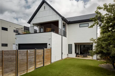 a front view of a house with a garage