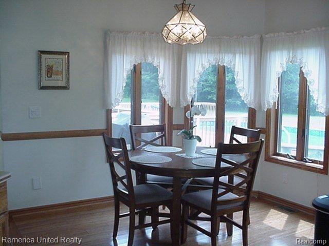 804 North Kellogg Road Howell, MI 48843 - Photo 14 of 61 EATING AREA TO DECK & POOL