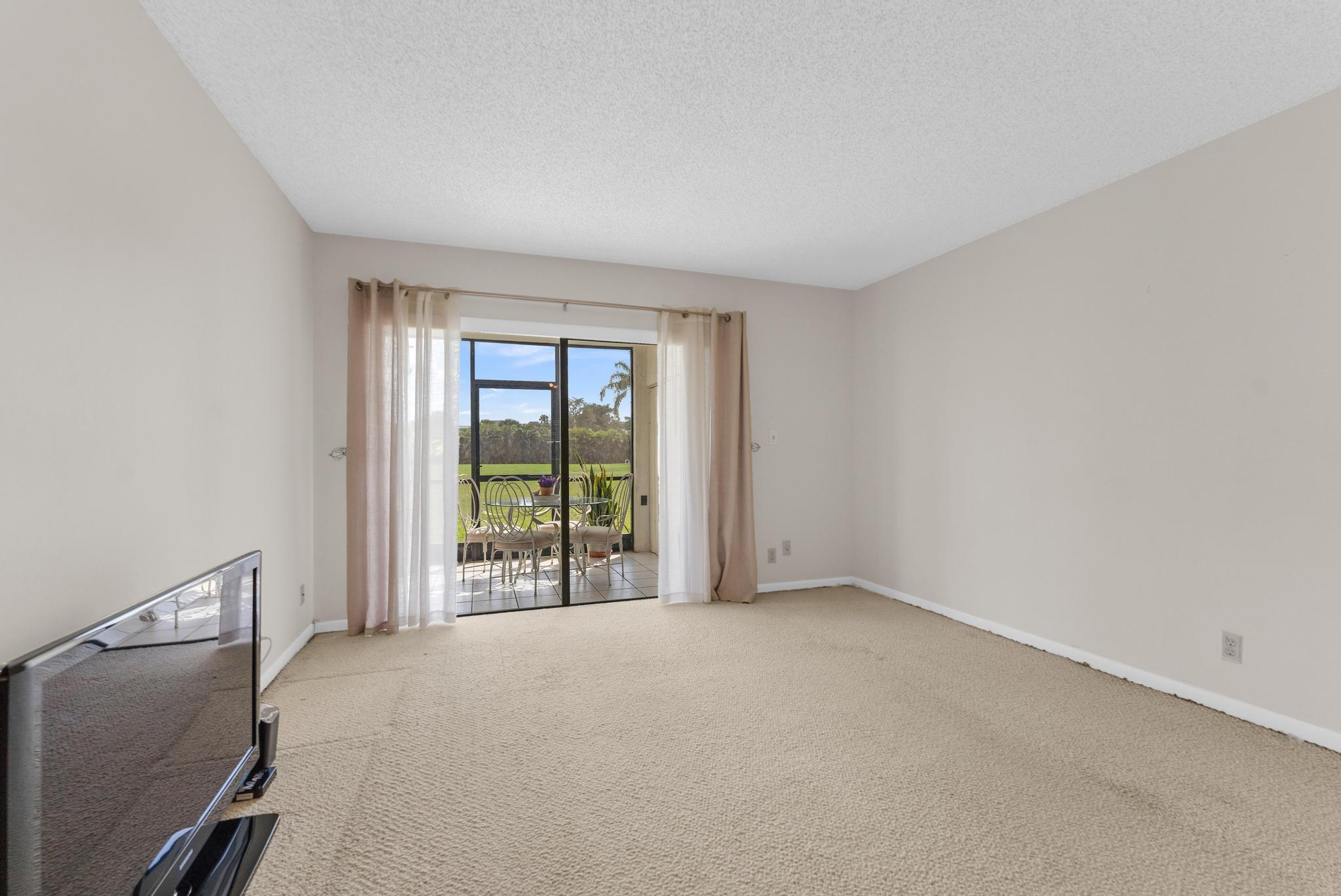 9300 Southwest 8th Street, Unit 109 Boca Raton, FL 33428 - Photo 5 of 34 Living Room