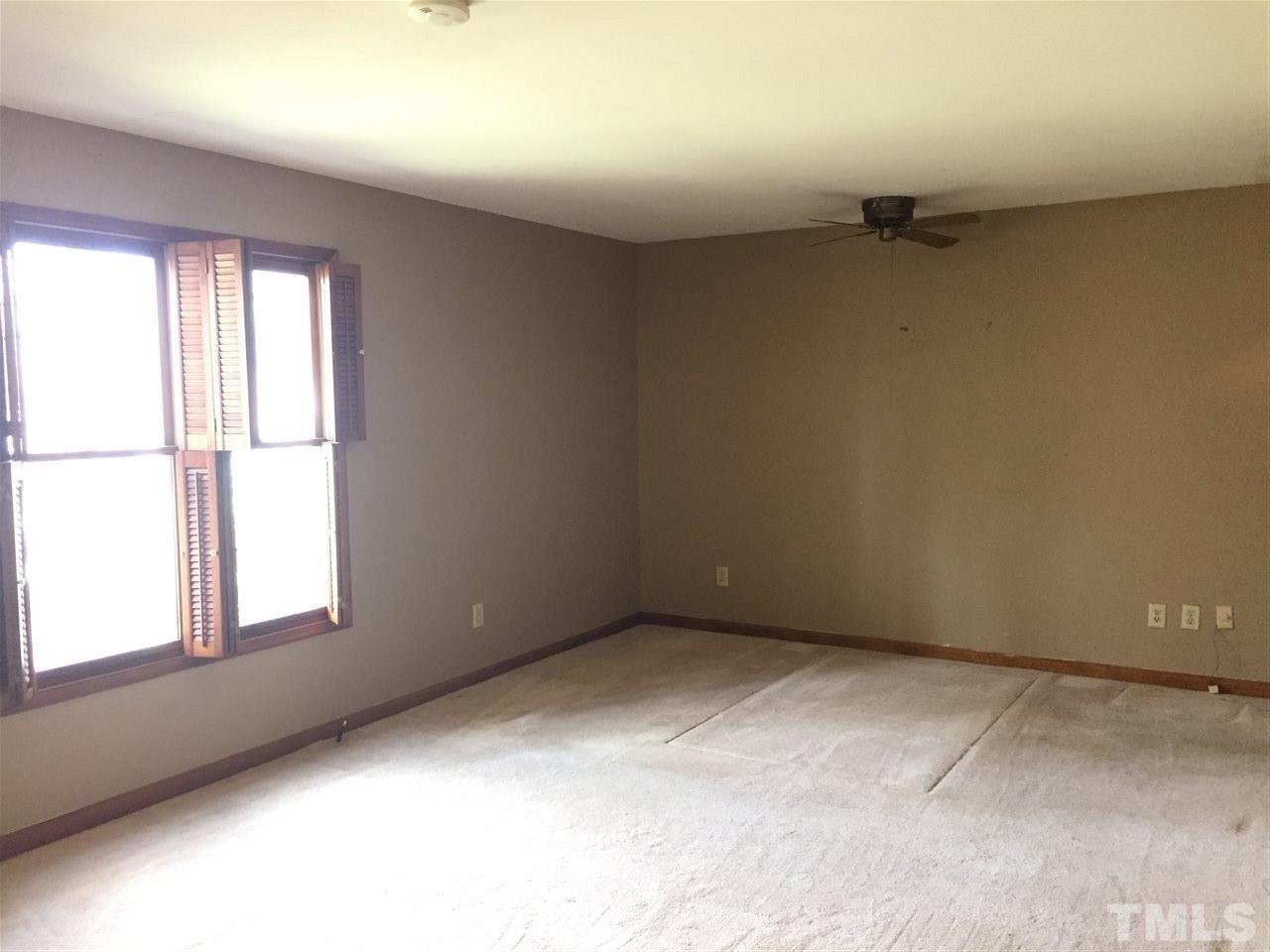 2757 Rue Sans Famille Raleigh, NC 27607 - Photo 12 of 21 an empty room with a window