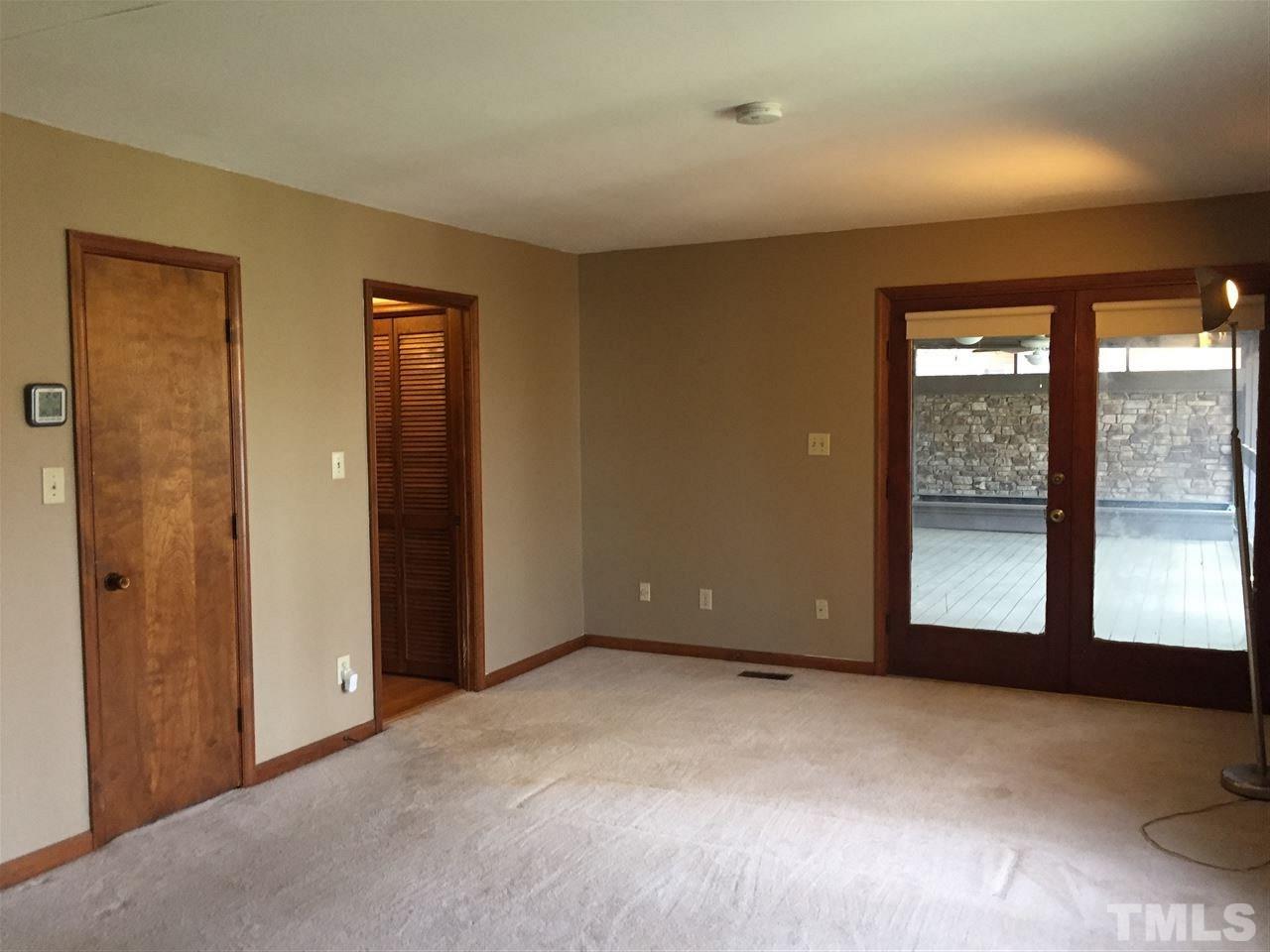 2757 Rue Sans Famille Raleigh, NC 27607 - Photo 13 of 21 a view of an empty room with a window