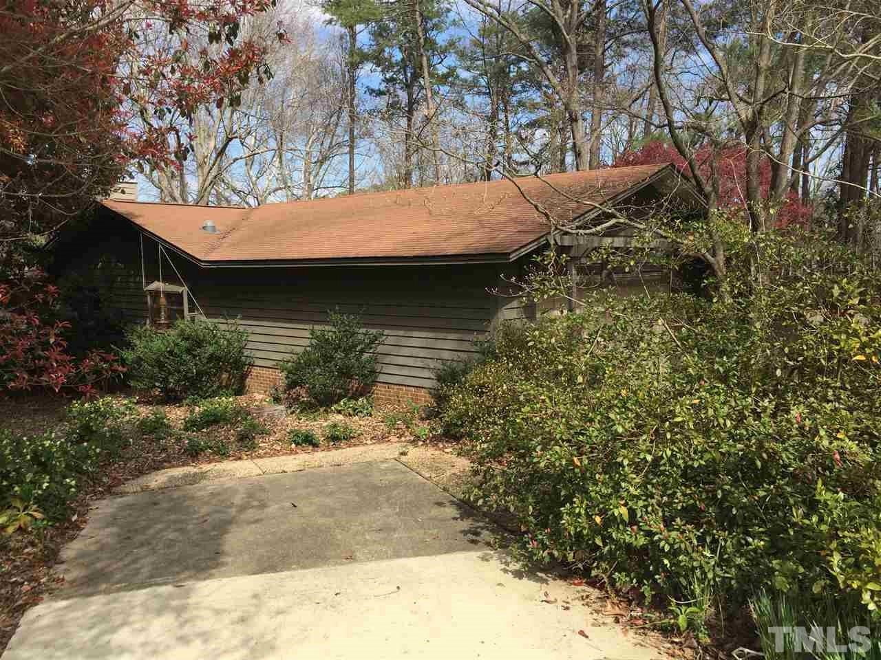 2757 Rue Sans Famille Raleigh, NC 27607 - Photo 3 of 21 a view of a house with a tree