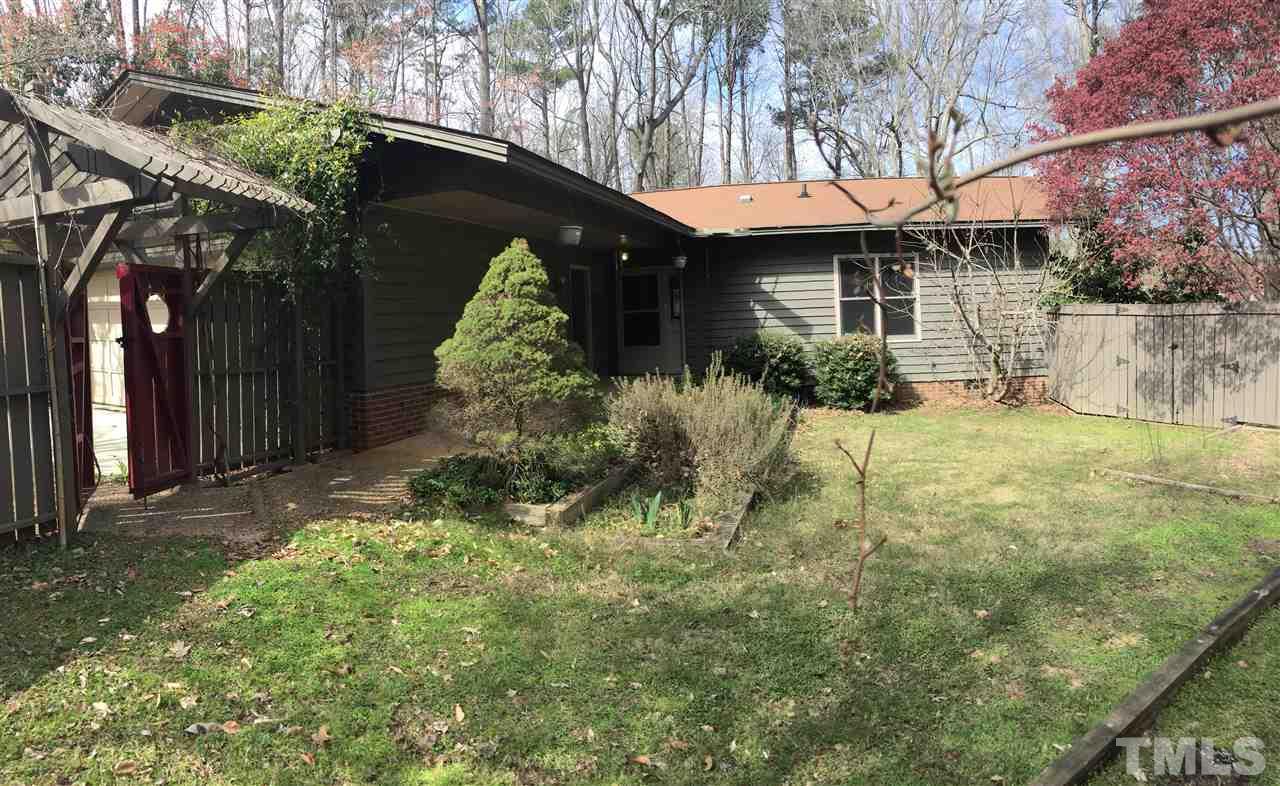 2757 Rue Sans Famille Raleigh, NC 27607 - Photo 6 of 21 a view of a house with a yard