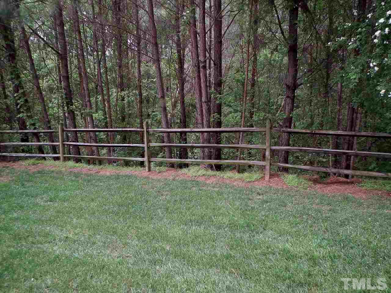 5318 Echo Ridge Road Raleigh, NC 27612 - Photo 11 of 25 a view of outdoor space with deck and yard