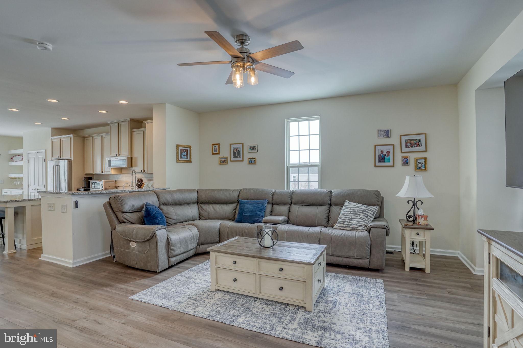 602 Barrie Road Middletown, DE 19709 - Photo 11 of 35 a living room with furniture and a ceiling fan
