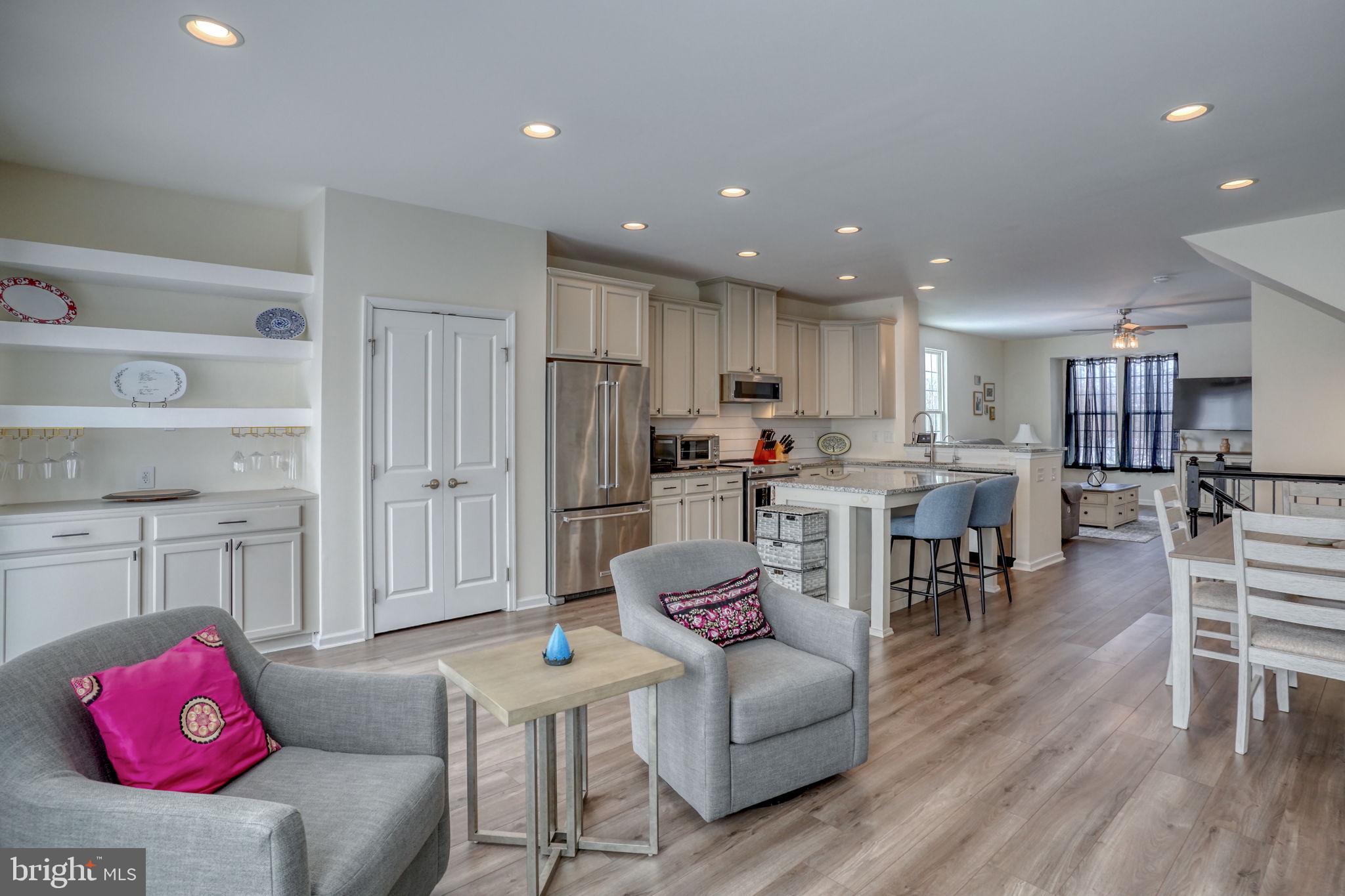 602 Barrie Road Middletown, DE 19709 - Photo 13 of 35 a living room with furniture and kitchen view