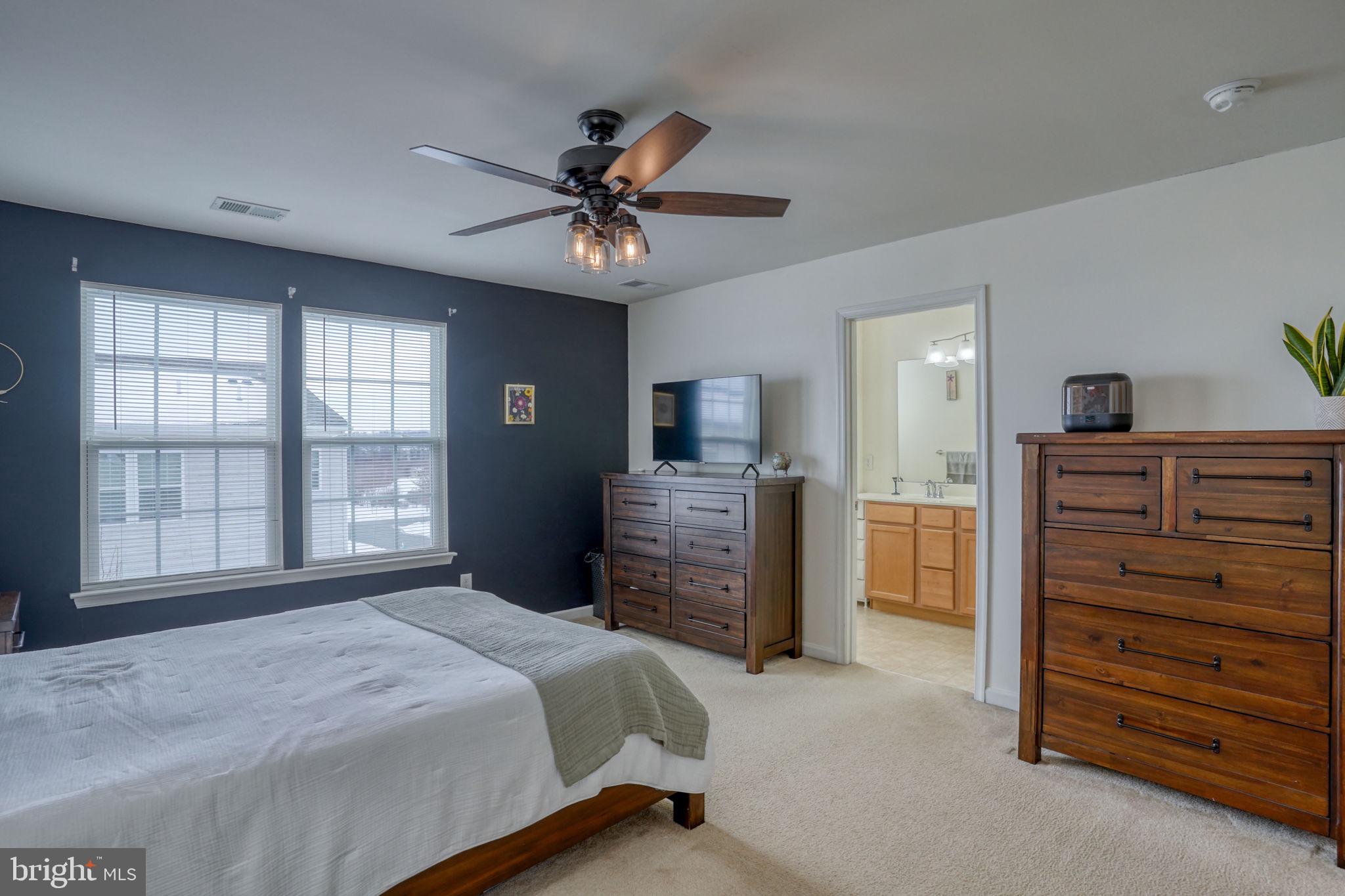 602 Barrie Road Middletown, DE 19709 - Photo 18 of 35 a bedroom with a bed and furniture