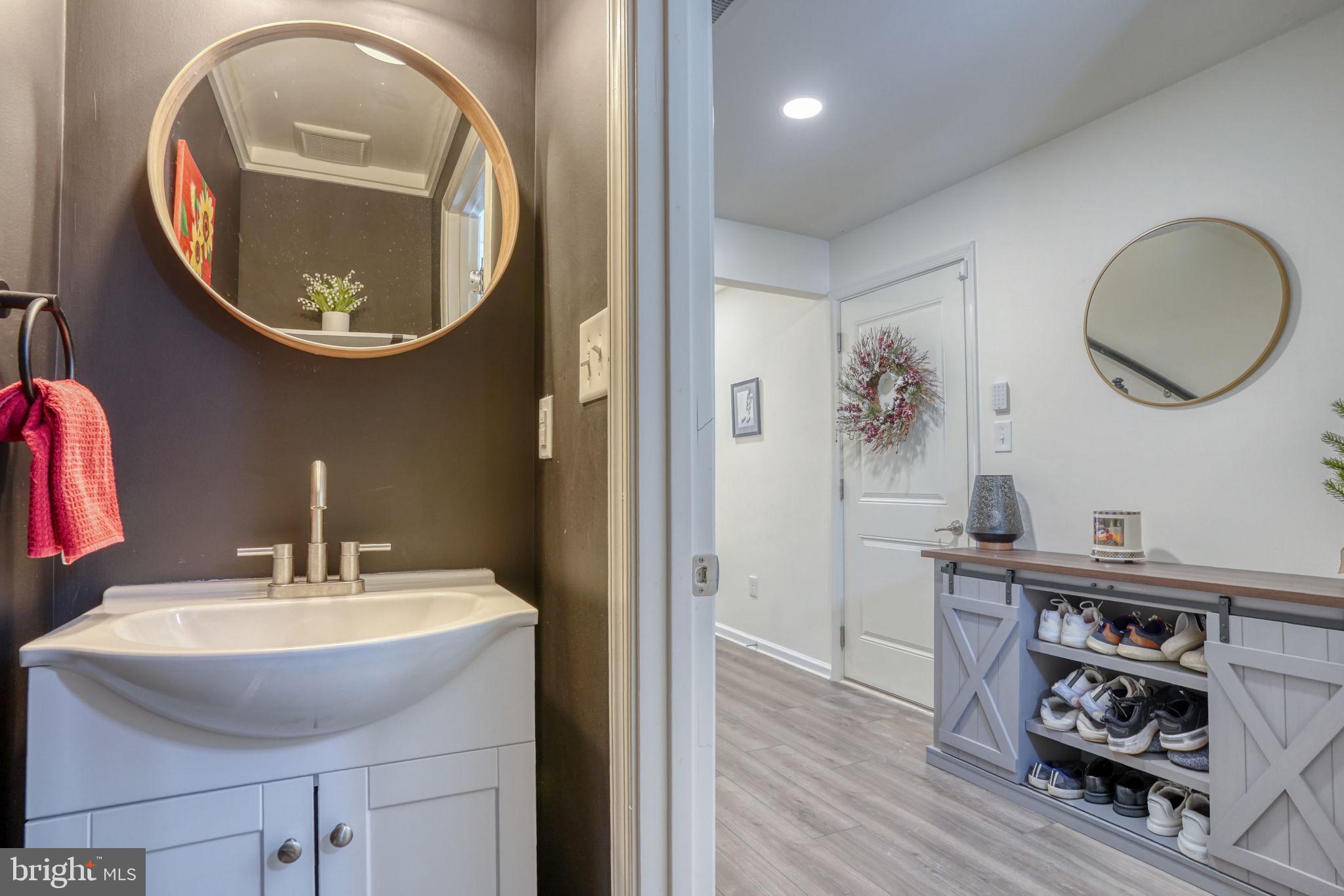 602 Barrie Road Middletown, DE 19709 - Photo 5 of 35 a bathroom with a sink and a mirror