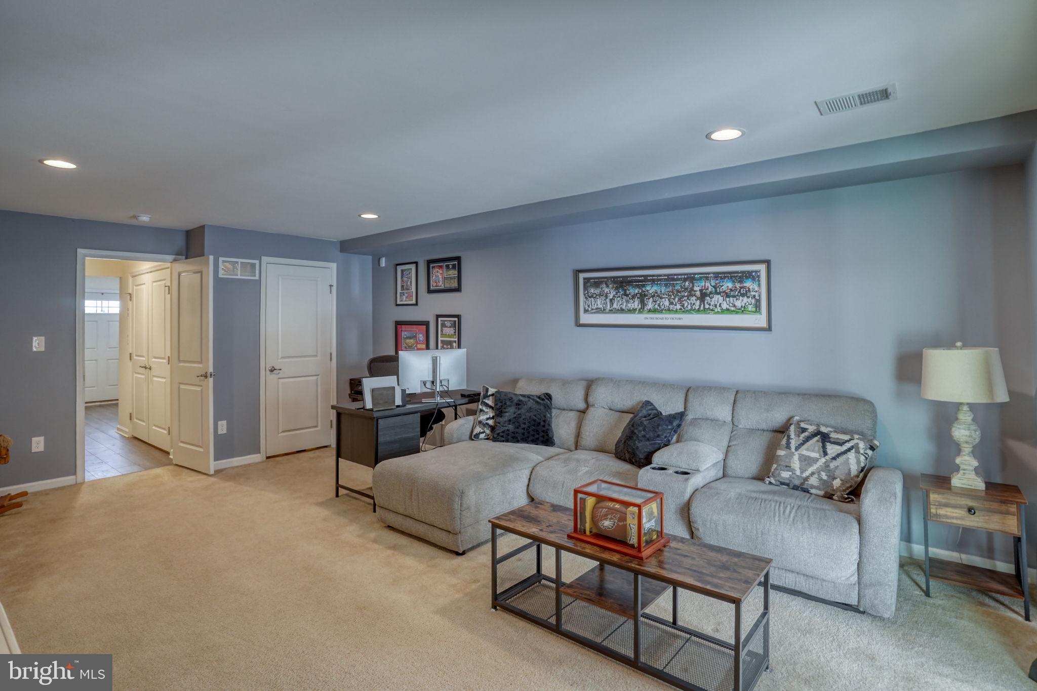 602 Barrie Road Middletown, DE 19709 - Photo 6 of 35 a living room with furniture and a lamp