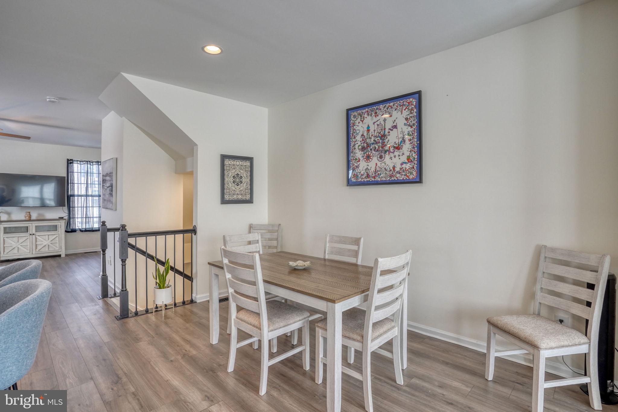602 Barrie Road Middletown, DE 19709 - Photo 10 of 35 a view of a dining room with furniture window and wooden floor
