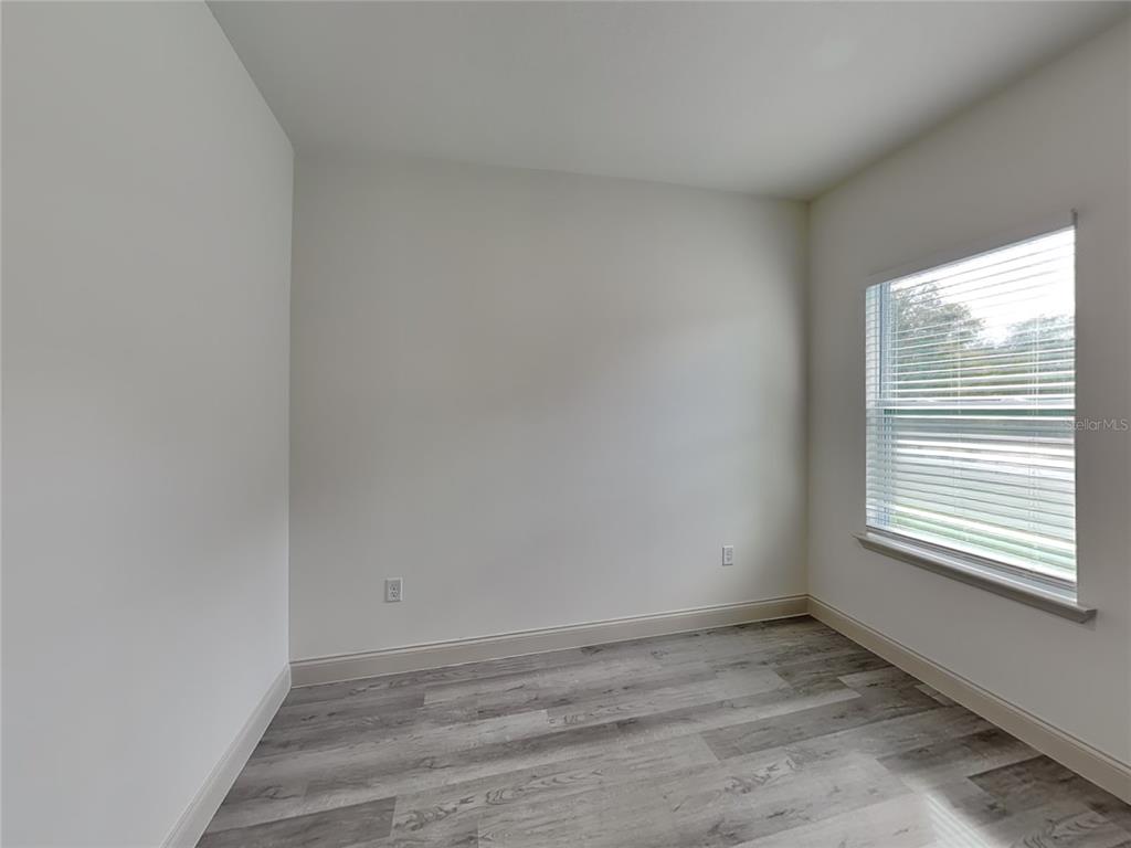 7780 North Maltese Drive Citrus Springs, FL 34433 - Photo 13 of 16 a view of an empty room and window