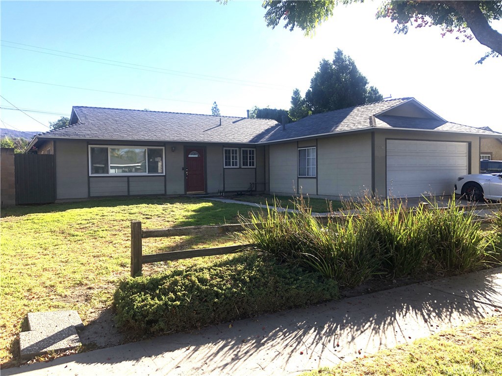 2206 Stinson Street Simi Valley, CA 93065 - Photo 2 of 2 a view of a house with a yard