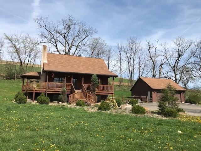 350 Plum Run Road Canonsburg, PA 15317 - Photo 2 of 20 Two bedroom log home with a two car detached garage. Enjoy the evenings on the wrap around porch