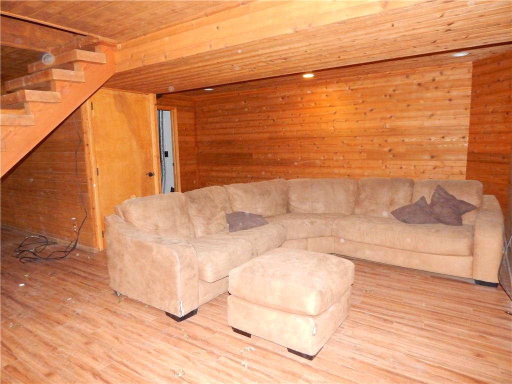 350 Plum Run Road Canonsburg, PA 15317 - Photo 15 of 20 Lower level Game room with cedar walls and ceiling. Laminate flooring on lower level. Game room has access to the outside right of the house.