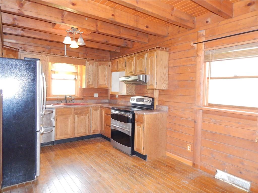 350 Plum Run Road Canonsburg, PA 15317 - Photo 6 of 20 Kitchen with cedar ceiling and walls. Complete with Stainless steel appliances.