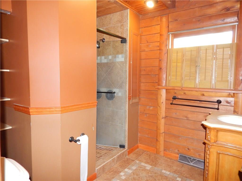 350 Plum Run Road Canonsburg, PA 15317 - Photo 9 of 20 Master Bathroom with ceramic tile shower cedar walls and ceiling along with a comvenient linen closet