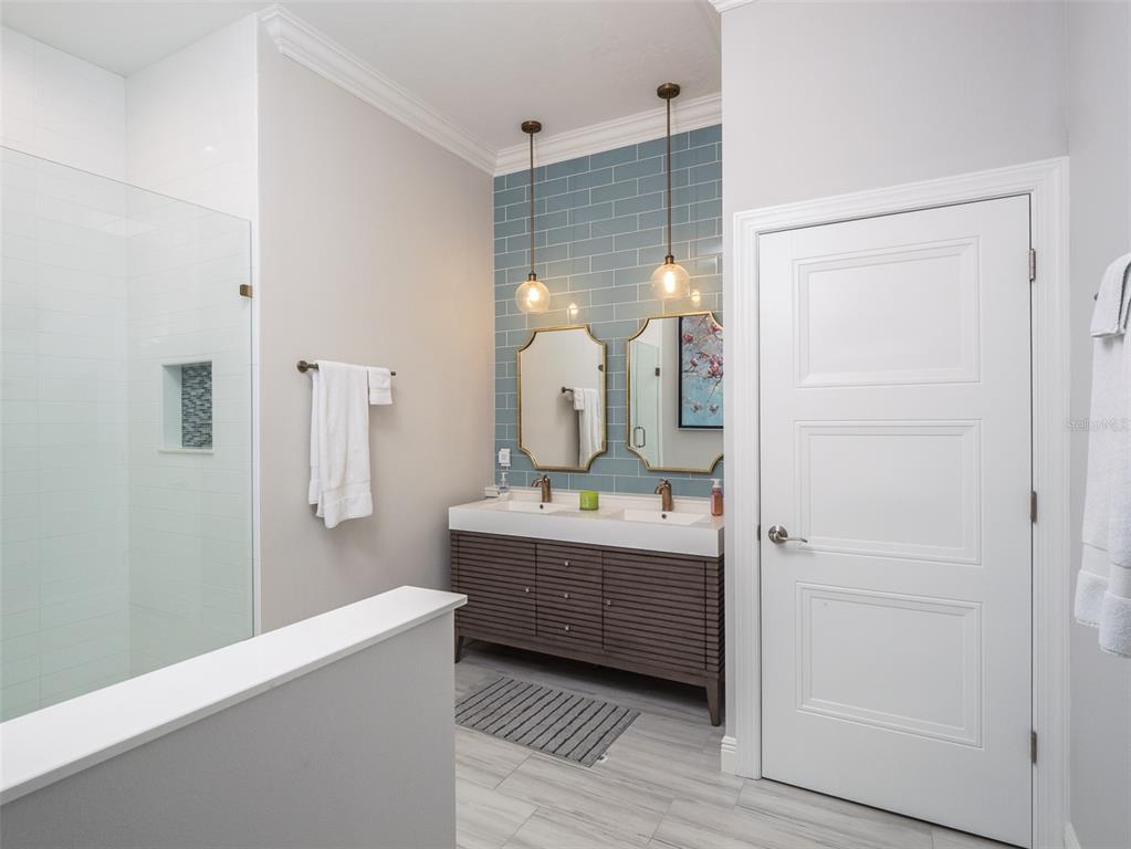 15225 Northwest 112th Place Road Morriston, FL 32668 - Photo 15 of 39 a room with a sink and a mirror