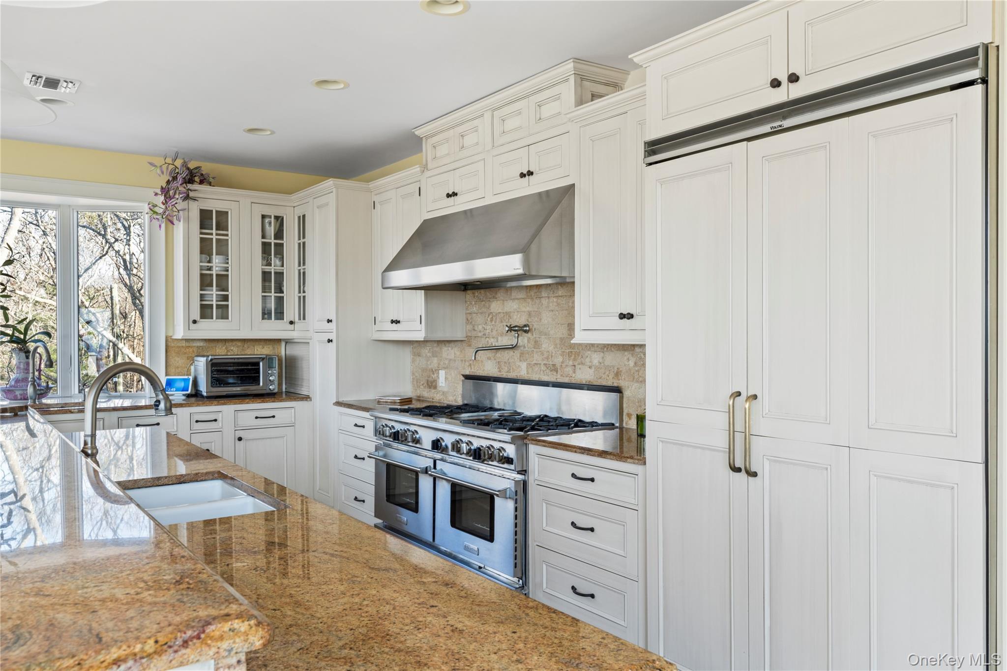 3172 Sound Avenue Riverhead, NY 11901 - Photo 14 of 49 Premium appliances, ample refrigeration and a thoughtful layout