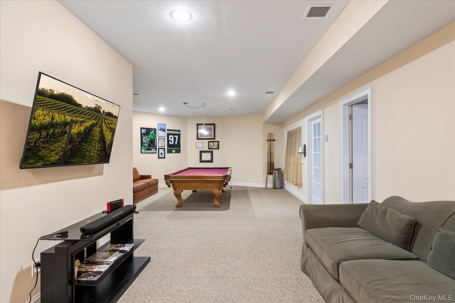 3172 Sound Avenue Riverhead, NY 11901 - Photo 34 of 49 This welcoming space offers flexibility for entertaining and relaxing