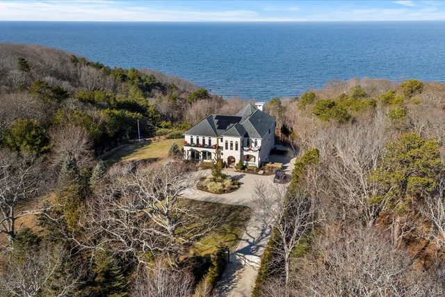 a view of a beach in front of a house