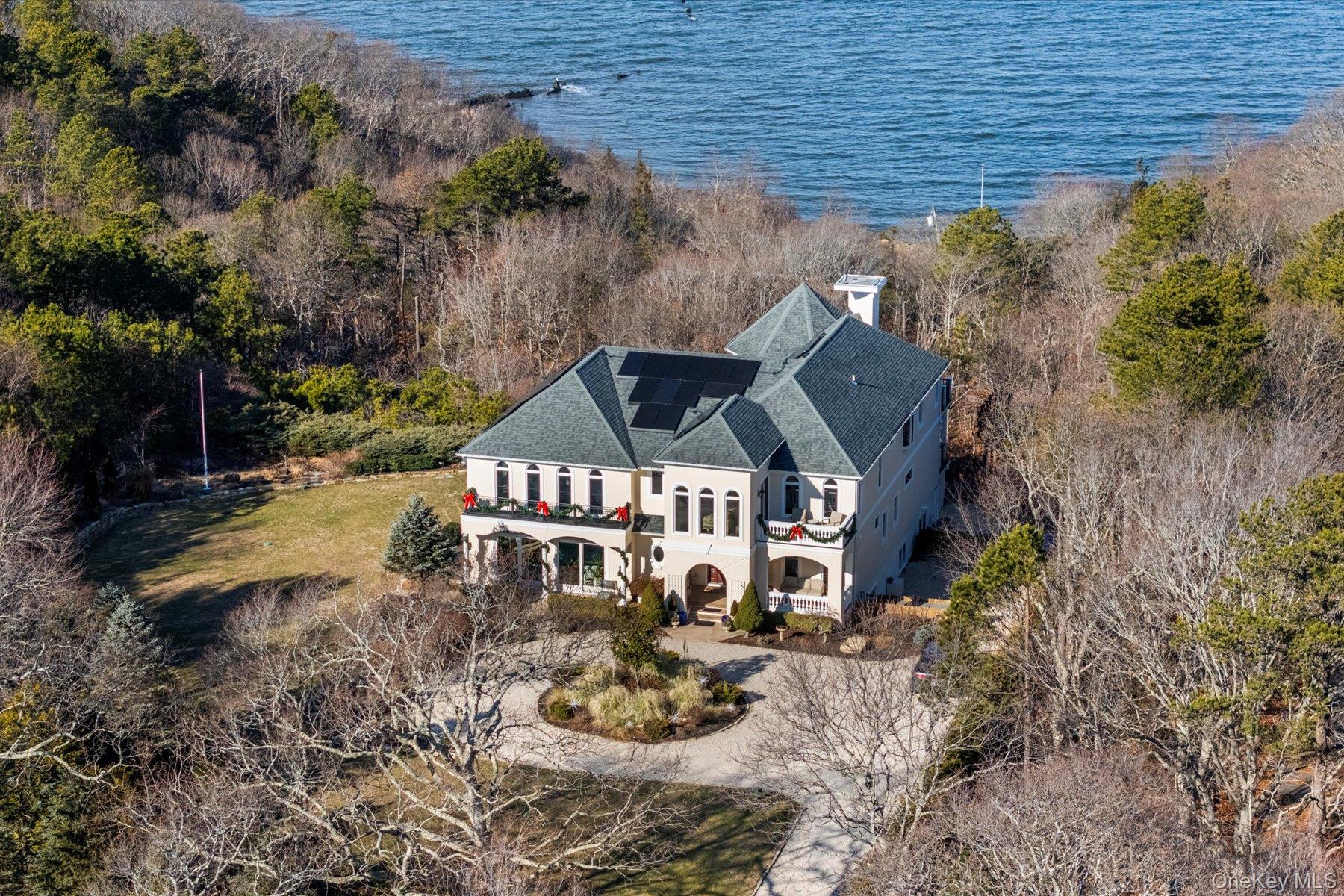 3172 Sound Avenue Riverhead, NY 11901 - Photo 45 of 49 Clean architectural lines meet a timeless coastal setting at this meticulous estate