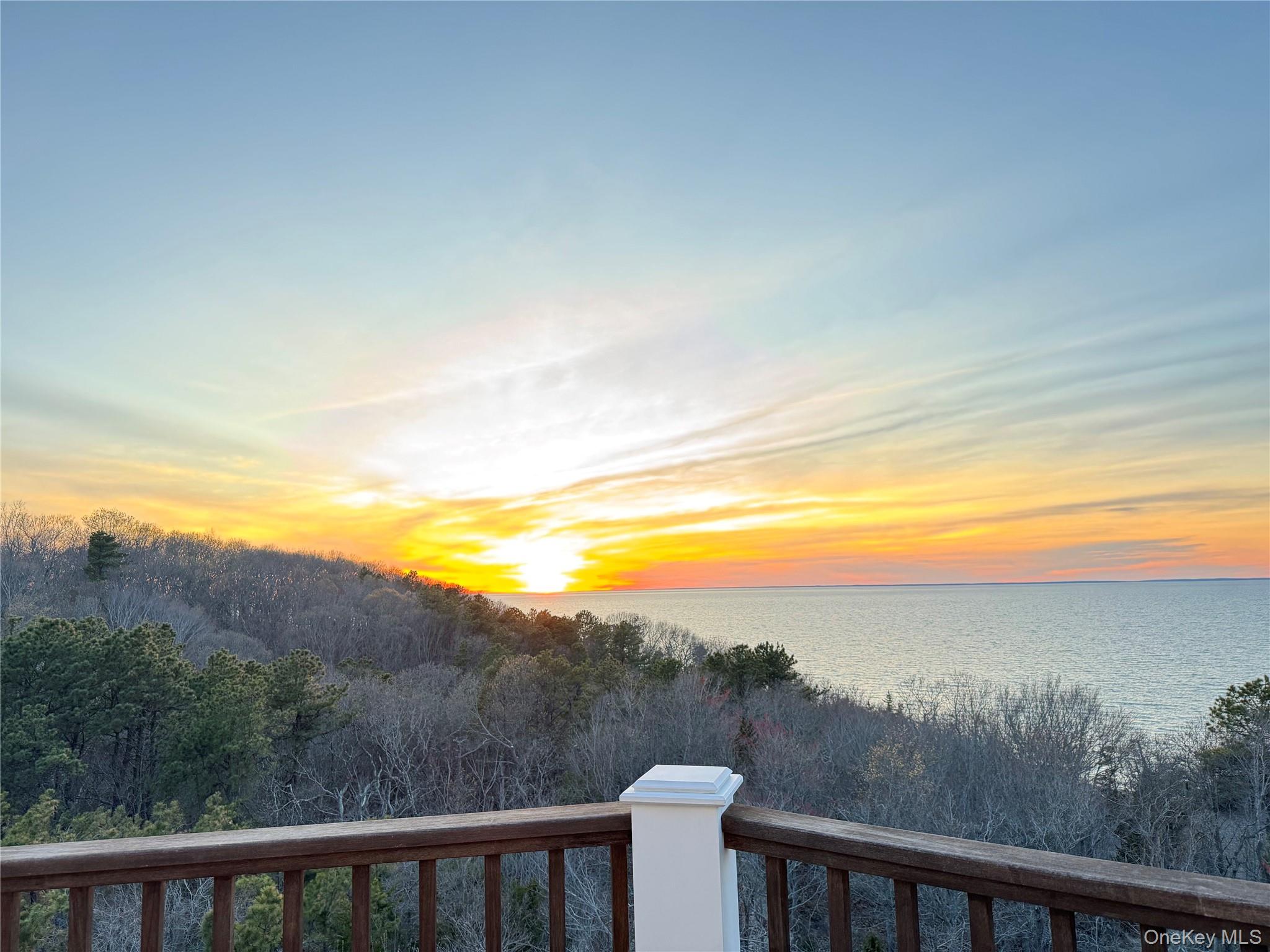 3172 Sound Avenue Riverhead, NY 11901 - Photo 48 of 49 The deck offers generous space for sunset viewing