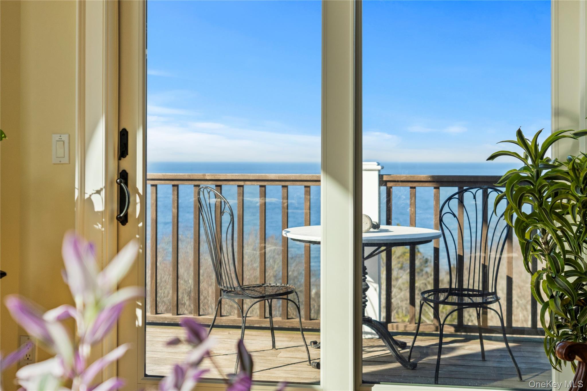 3172 Sound Avenue Riverhead, NY 11901 - Photo 10 of 49 Anchored by water views and natural light, the great room blends comfort with an easy connection to the outdoors