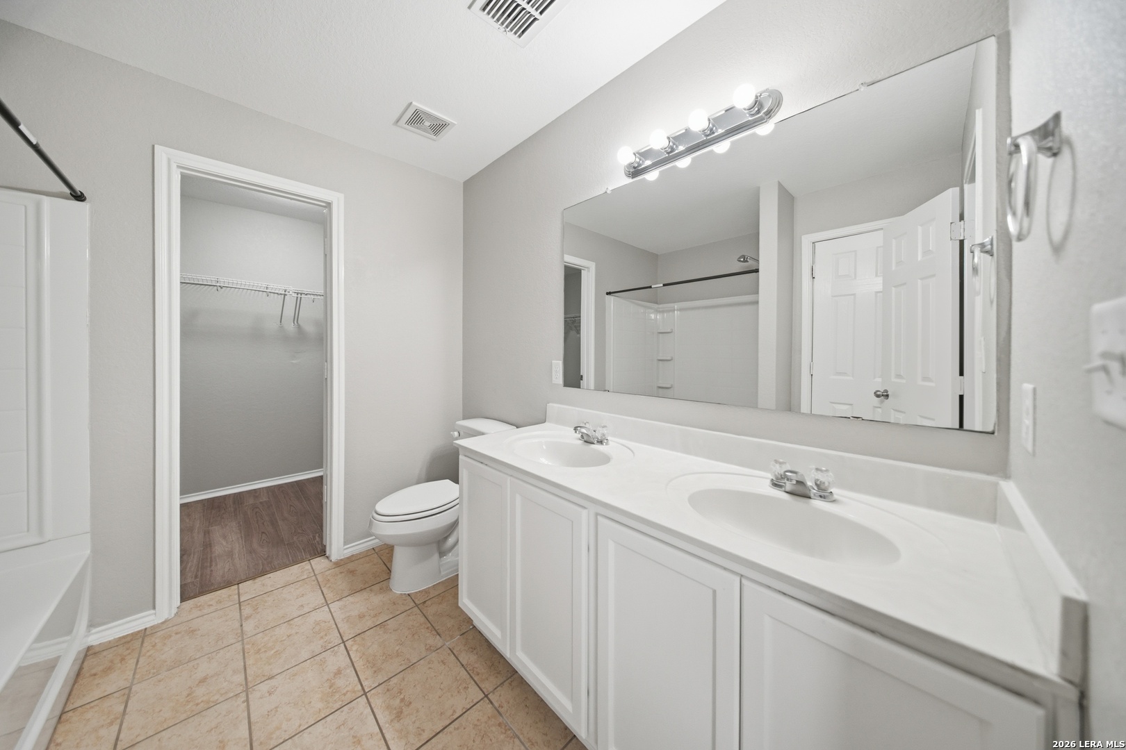 403 Walnut Crest Schertz, TX 78154 - Photo 19 of 30 a bathroom with a sink a toilet and shower
