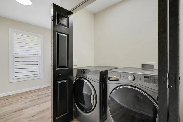 a view of livingroom with washer and dryer