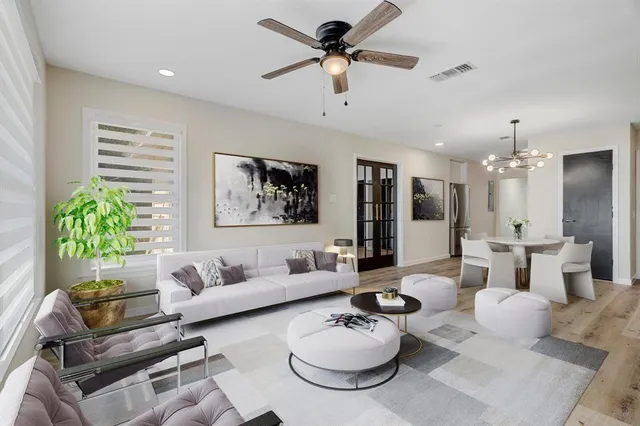 a living room with furniture and a table