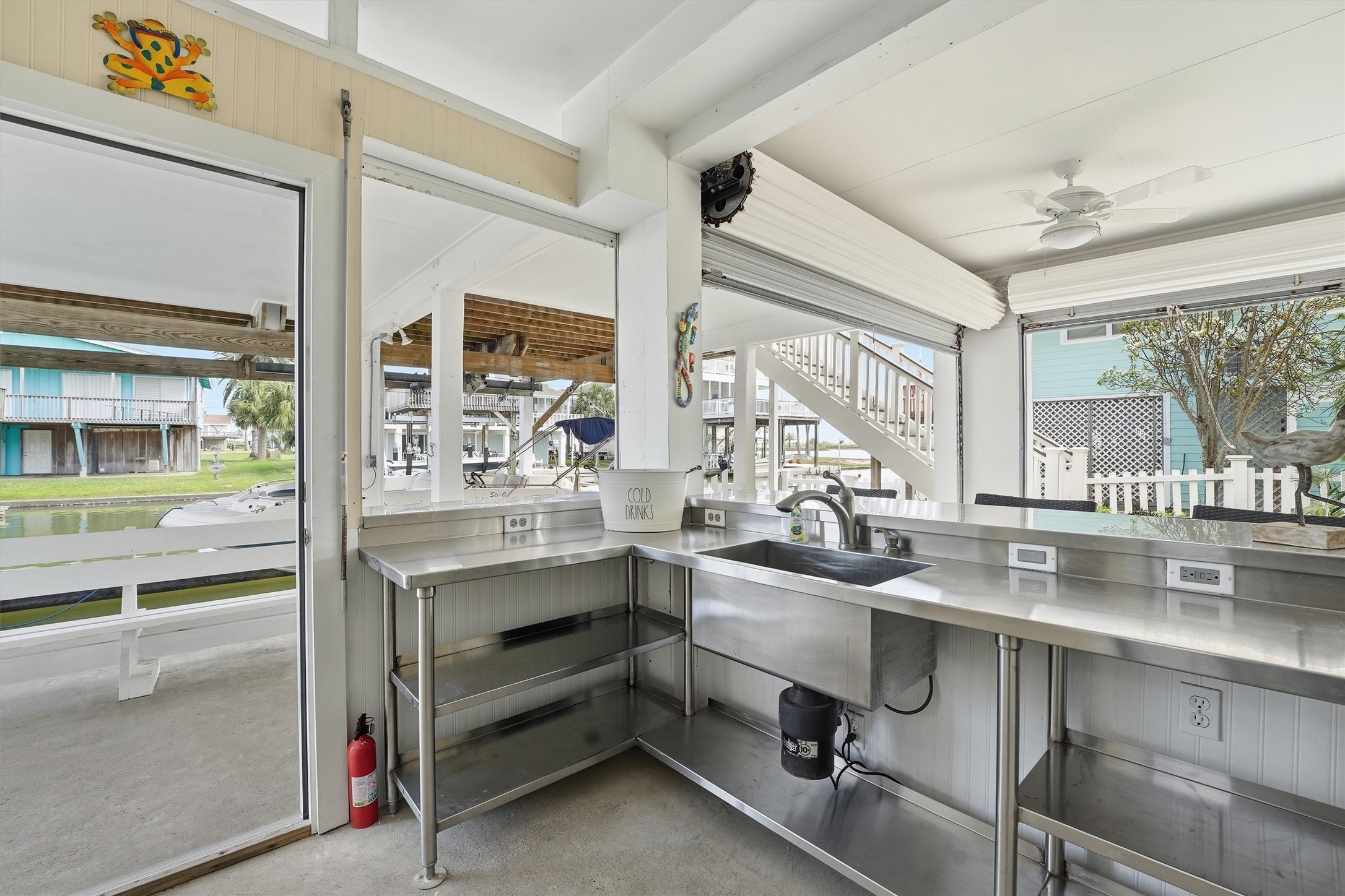 16635 Jamaica Cove Road Jamaica Beach, TX 77554 - Photo 16 of 45 a kitchen with sink and window