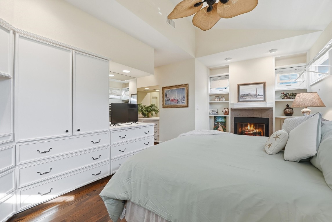 16635 Jamaica Cove Road Jamaica Beach, TX 77554 - Photo 19 of 45 a bed room with a bed and a television