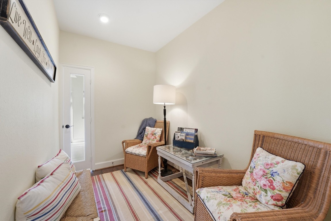 16635 Jamaica Cove Road Jamaica Beach, TX 77554 - Photo 27 of 45 a living room with furniture and a rug